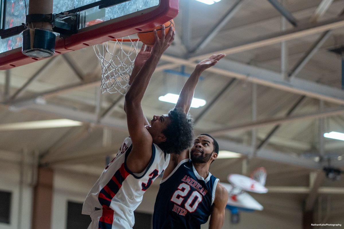 Bear Cubs' forward Jaden Washington yells as he goes for a layup against American River at Haehl Pavilion on Friday, Feb. 21, 2025.