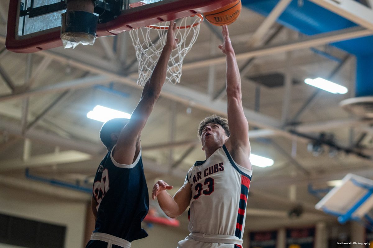 Bear Cubs' forward Audon Forgus surges up powerfully for a lau-up against American River at Haehl Pavilion on Friday, Feb. 21, 2025.