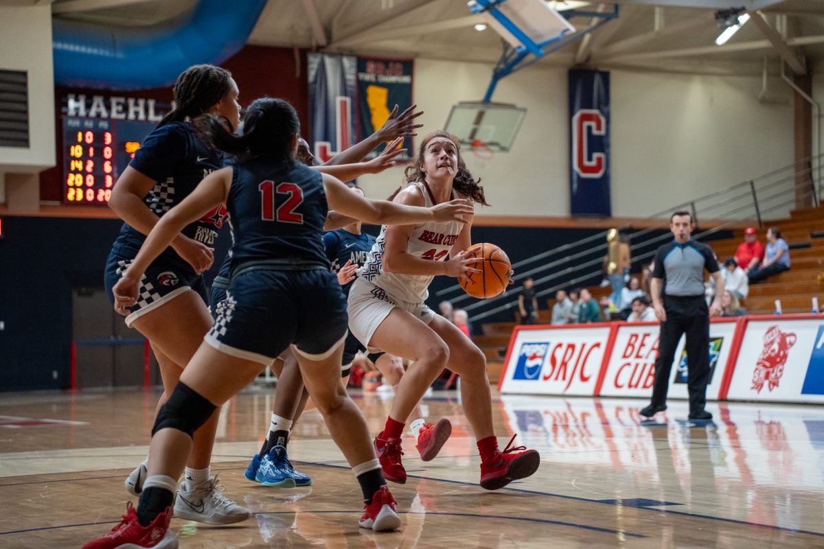 Bear Cubs guard Ivy Gonzalez attempts a two pointer while outnumbered against American River College at Haehl Pavilion on Friday, Feb. 21, 2025.