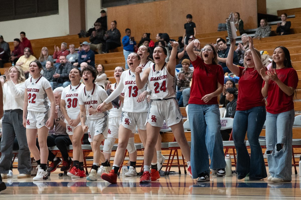 The Bear Cubs bench cheers after a score against American River College at Haehl Pavilion on Friday, Feb. 22, 2025.