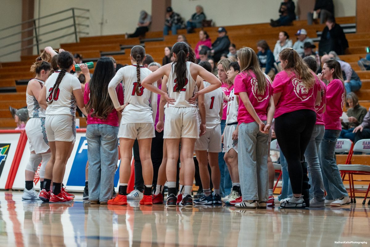 The Bear Cubs huddle around headcoach Lacey Campbell during a timeout during the latter stages of their defeat to Cosumnes River on Friday, Feb. 7, 2025