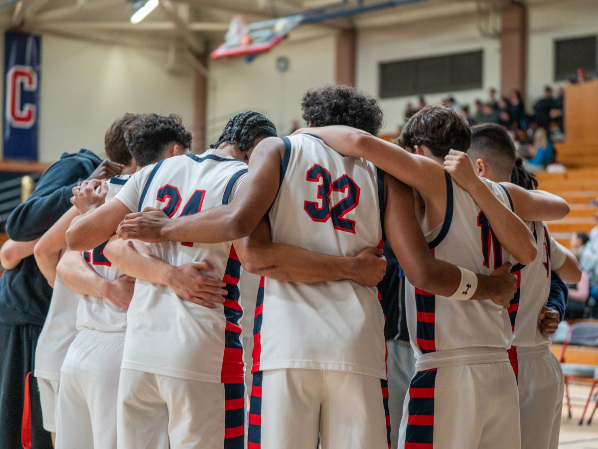 The SRJC men's basketball team huddles up ahead of sophomore night against the American River Beavers at home on Friday, Feb. 21, 2025.