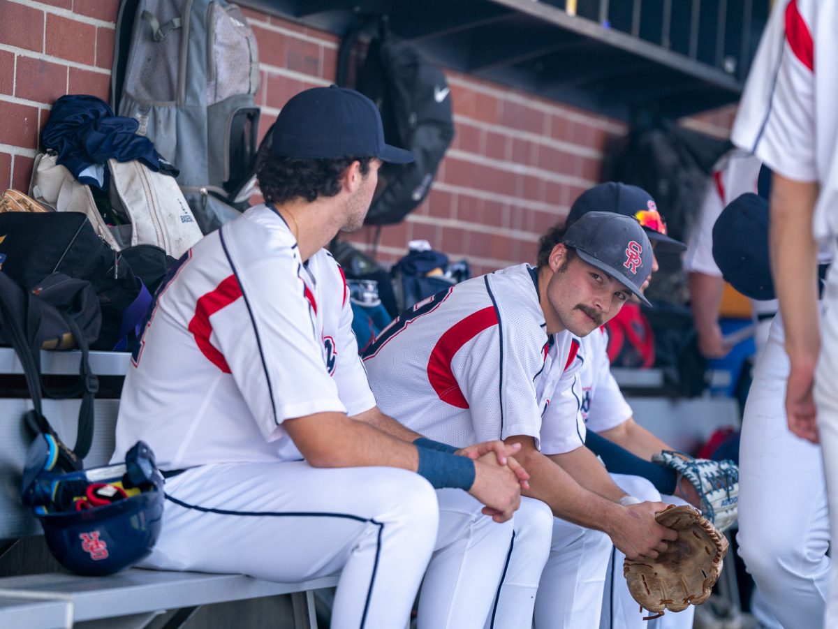 Freshman left fielder Shane Moran looks toward the field as he prepares for the game against Chabot College at home, Friday, Jan. 24, 2025.