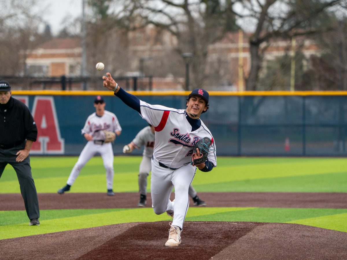 Sophomore pitcher Raul Valdivia hurls a pitch towards home plate in the game against Lassen College at home, Sunday, Feb. 16, 2025.