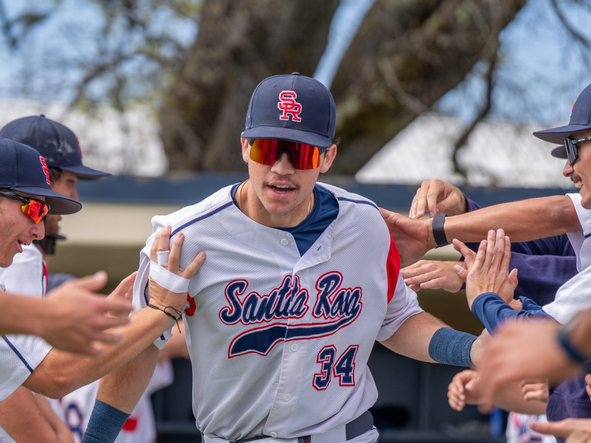 Designated hitter J.T. Summers runs out of the dugout as he is announced overhead prior to the home game against San Joaquin Delta on Tuesday, March 11, 2025 in Santa Rosa.