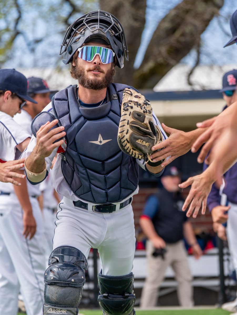 Sophomore catcher Cameron Duran strolls out of the dugout and towards home plate prior to the game against San Joaquin Delta on Tuesday, March 11, 2025 in Santa Rosa.