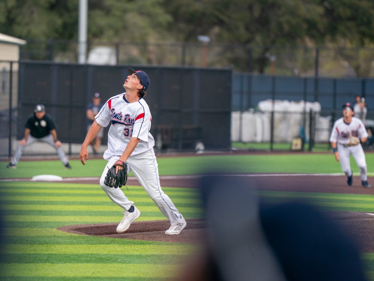 Sophomore pitcher Luke Schat tracks the final out as Delta's third baseman Samuel Rivas fouls out to end the first game of the series against San Joaquin Delta on Tuesday, March 11, 2025 in Santa Rosa.