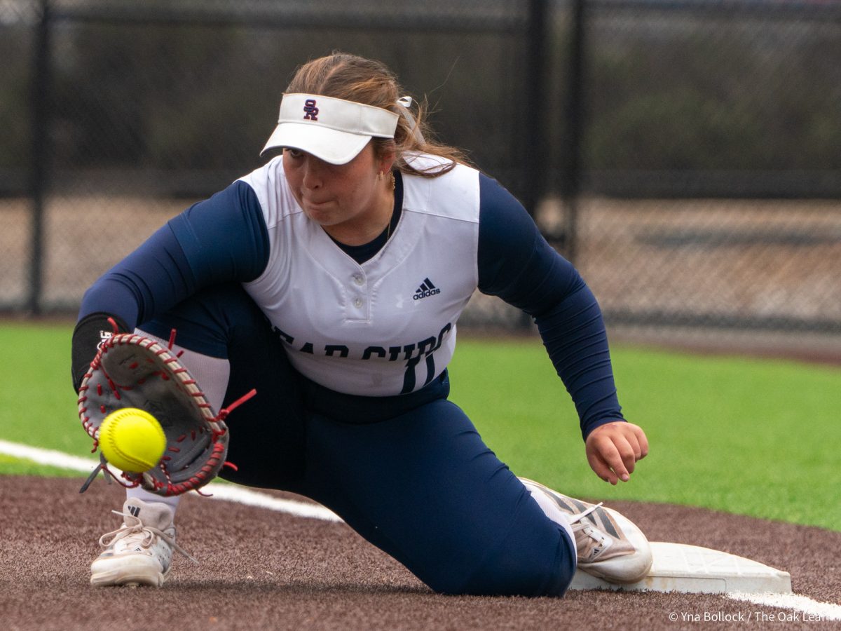 Sophomore first baseman Sofia Uricoechea receives the ball at first with foot on the base for the out against Modesto on Saturday, March 15, 2025 in Santa Rosa.