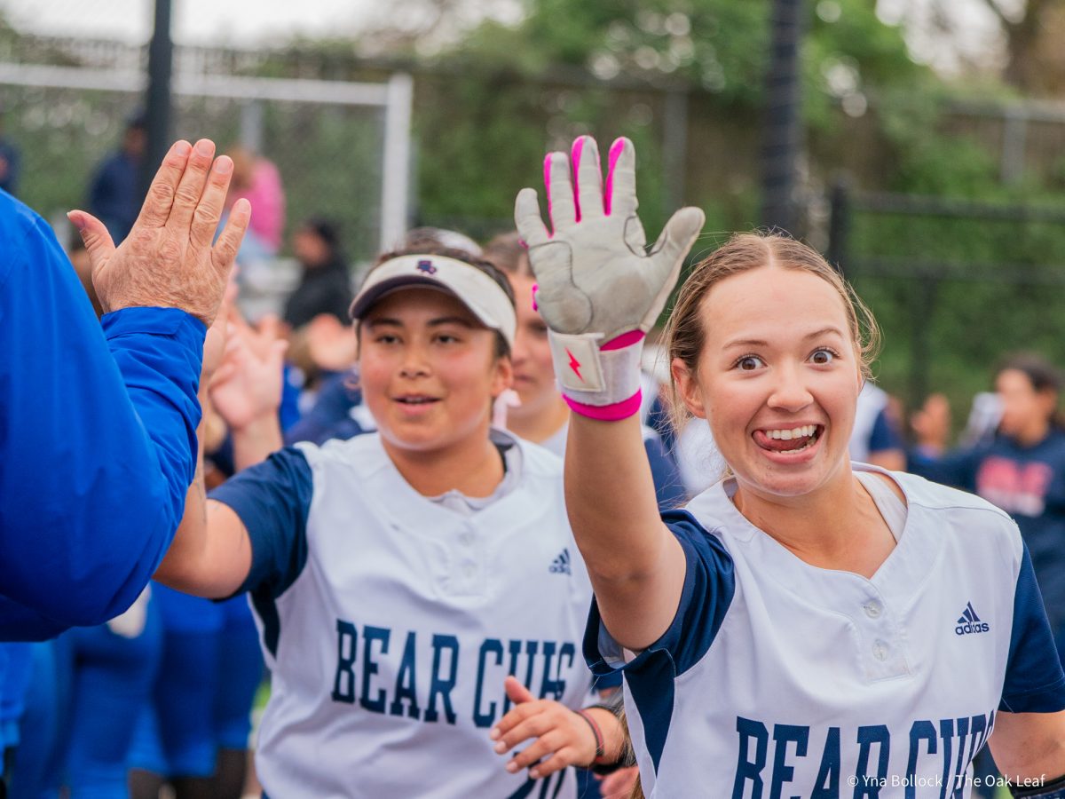 Freshman Emma Bushby waves as she runs by after the Bear Cubs win against Modesto on Saturday, March 15, 2025 in Santa Rosa.