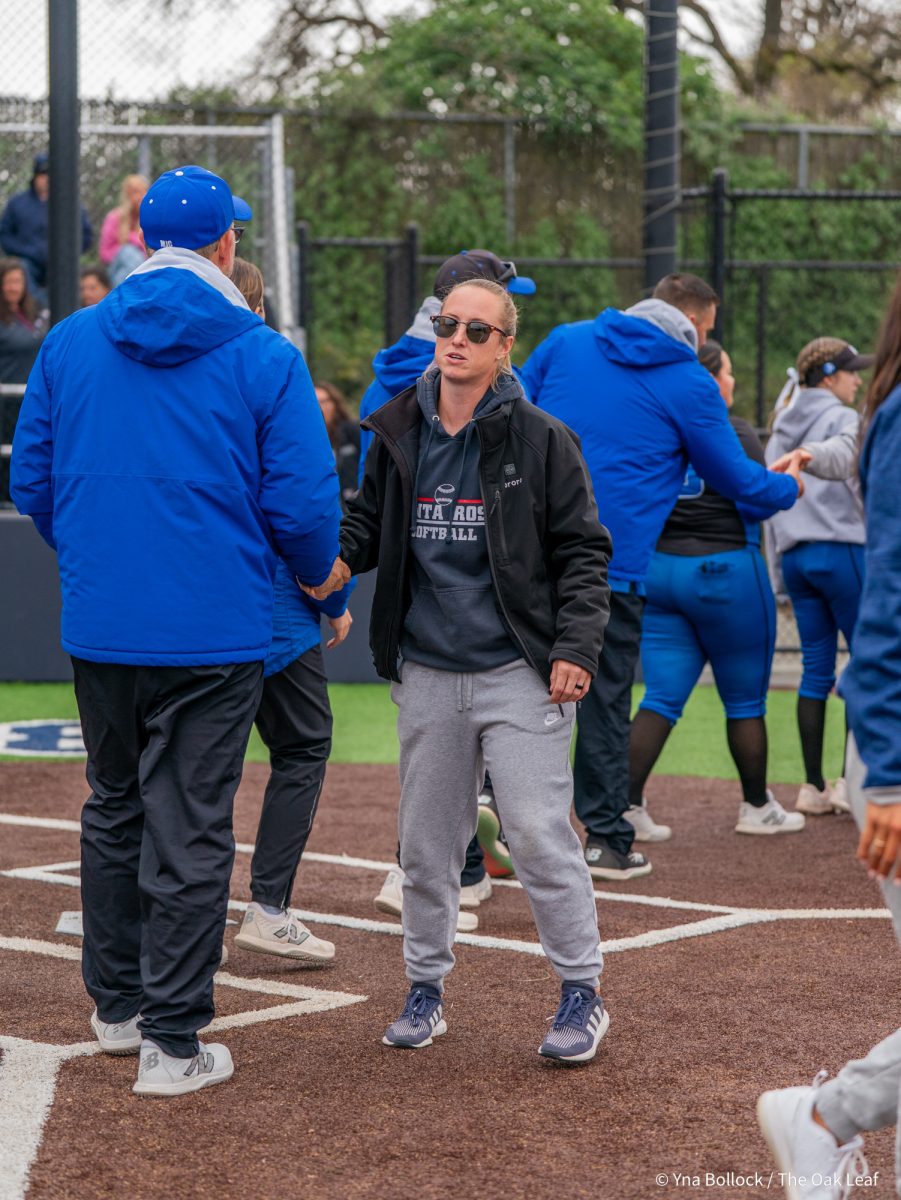 Head coach Madison Green shakes hands with the Modesto coaching team after the Bear Cubs win against Modesto on Saturday, March 15, 2025 in Santa Rosa.