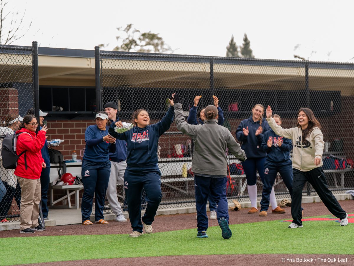 High fives all around for Monica during the SRJC Softball Alumni Home Run Derby on Saturday, March 15, 2025 in Santa Rosa.