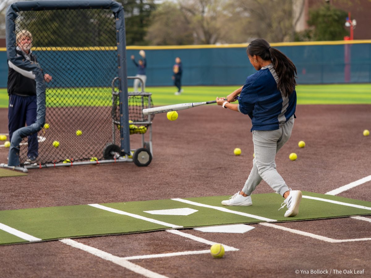 Assistant coach Anna Zoia-Bueshcer takes soft toss pitches from her dad Doug Buescher during the SRJC Softball Alumni Home Run Derby on Saturday, March 15, 2025 in Santa Rosa.