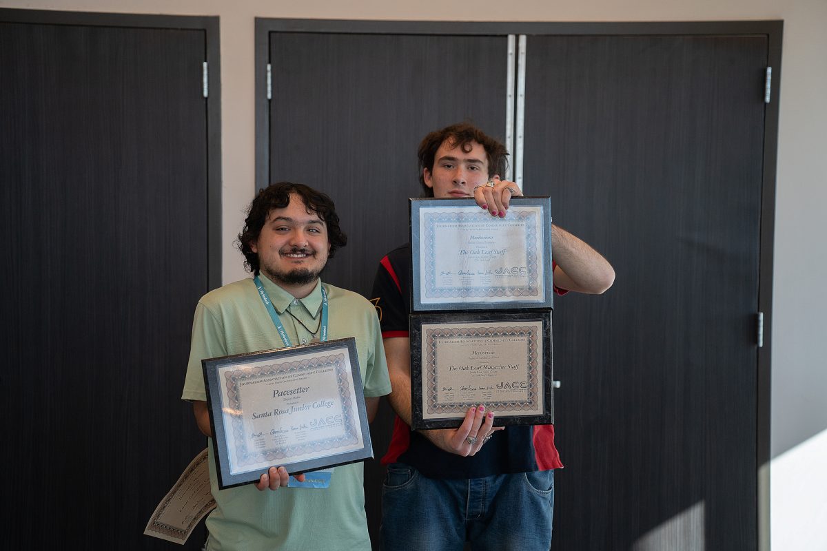 The Oak Leaf's Co-Editors in Chiefs, Lucas Cadigan-Carranza and Rosemary Cromwell proudly displays The Oak Leaf's collective Meritorious and Pacesetter awards at the ACP Spring National Media Conference on Saturday, March 8, 2025 in Long Beach, California.