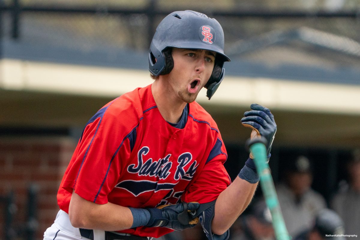 Santa Rosa Junior College's designated hitter Caze Derammelaere is fired up as he throws his bat and runs to first base after being struck by the pitch against San Joaquin Delta on Saturday, March 15, 2025 in Santa Rosa.
