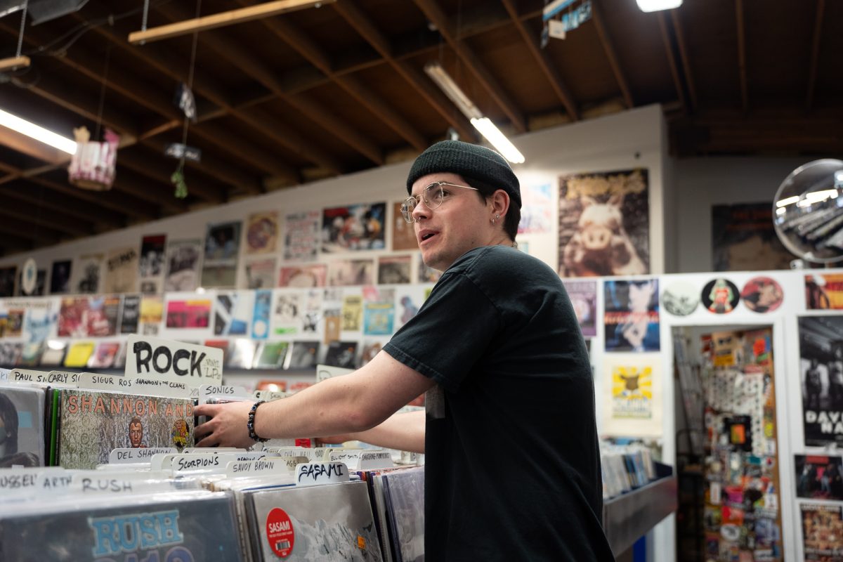 Trey Tuxhorn checks out the rock section at The Last Record Store on Mendocino Boulevard on Saturday, March 1, 2025.