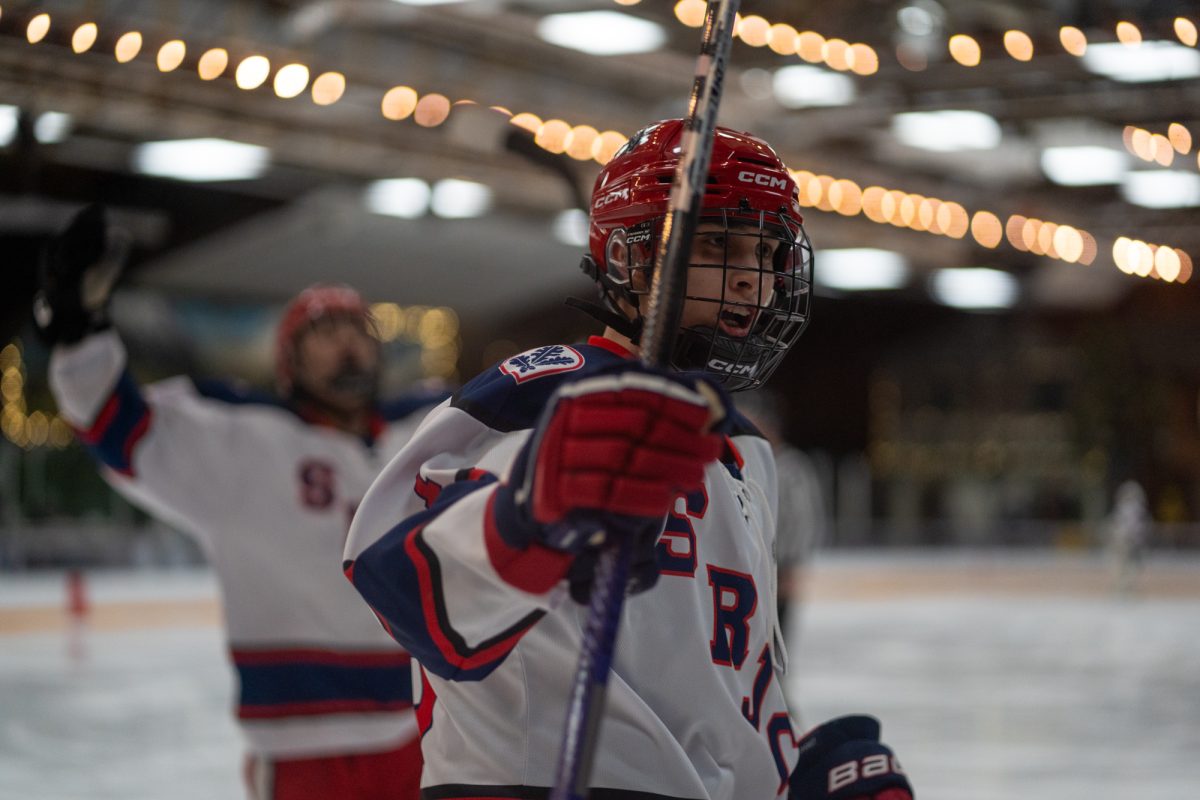 Polar Bears forward Austin Gunter celebrates after a goal against the University of Nevada, Reno at Snoopy's Home Ice on Friday, Feb. 21, 2025.