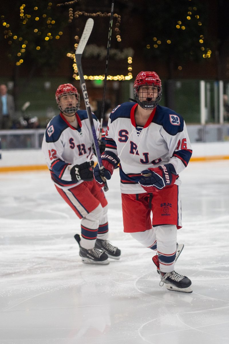 Polar Bears forwards Antonio Hernandez and Austin Gunter celebrate after a goal against the University of Nevada, Reno at Snoopy's Home Ice on Friday, Feb. 21, 2025.