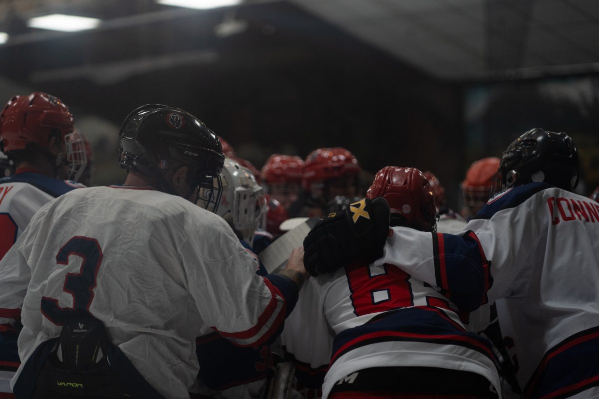 The Polar Bears huddle before their match against the University of Nevada, Reno at Snoopy's Home Ice on Friday, Feb. 21, 2025.
