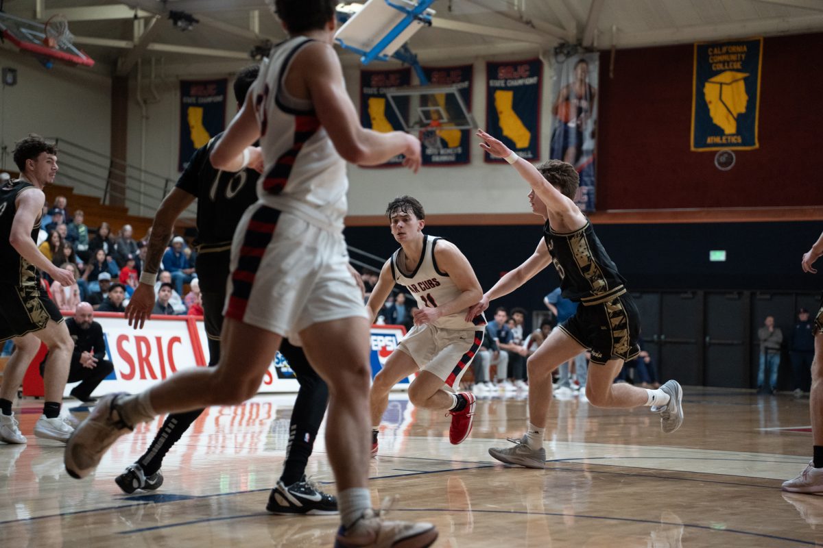 Bear Cubs guard Spencer Langowski fights through Yuba College's defense at Haehl Pavilion on Saturday, March 1, 2025.