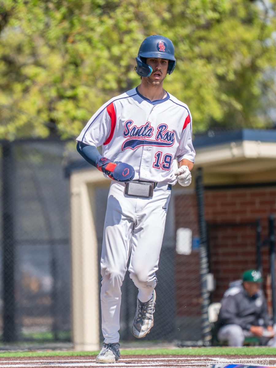 Freshman center fielder Cooper Wood stomps on home plate for the first RBI of the day for Santa Rosa in the bottom of the first against Diablo Valley College on Thursday, April 3, 2025 in Santa Rosa.