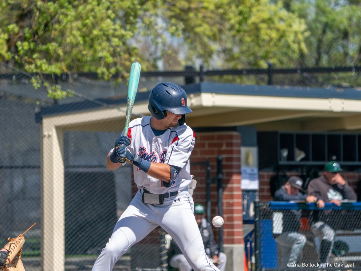 Diablo Valley staff look on as freshman third baseman Caze Derammelaere winces from a pitch to the thigh, Diablo Valley's second consecutive hit-by-pitch in the bottom of the second on Thursday, April 3, 2025 in Santa Rosa.
