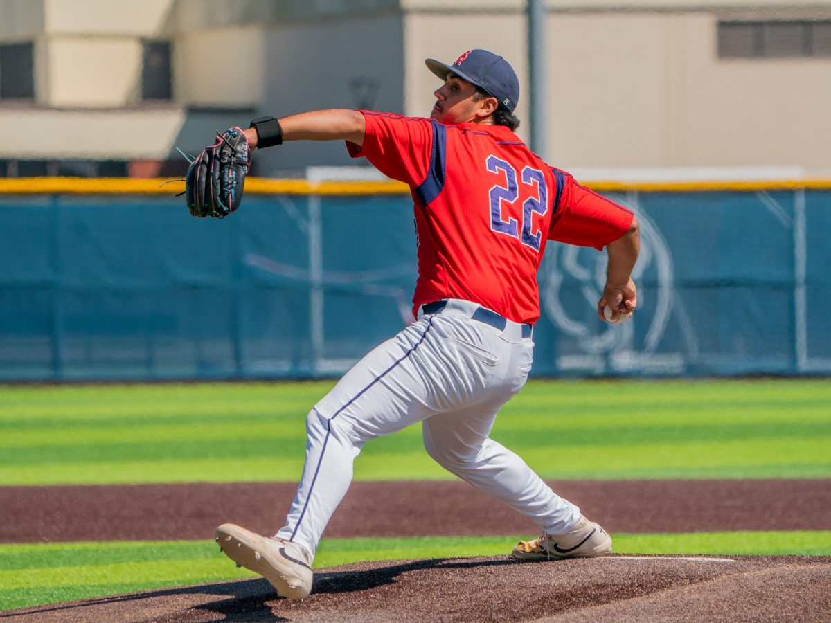 Sophomore Raul Valdivia winds up to throw another pitcher against Sacramento City College on Friday, April 18, 2025 at home.