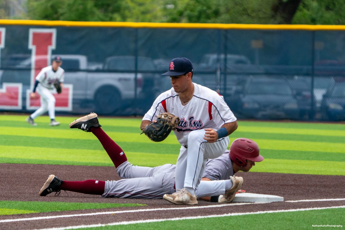 Santa Rosa Junior College's sophomore first basemen Josh Martin catches a pickoff against Sac City College on Tuesday, April 15, 2025 in Santa Rosa.
