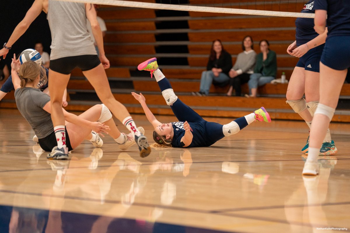 Former Bear Cubs defensive specialist Jaiden Brooner sprawls out on the floor after missing a dig on Friday, April 18, 2025 at Haehl Pavilion.