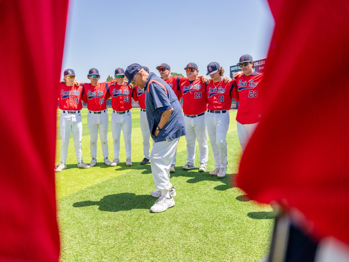 Assistant coach Tom Francois gathers the baseball team together to get focused prior to the first game of the 3C2A Baseball Regionals against American River College on Friday, May 2, 2025 at home. 