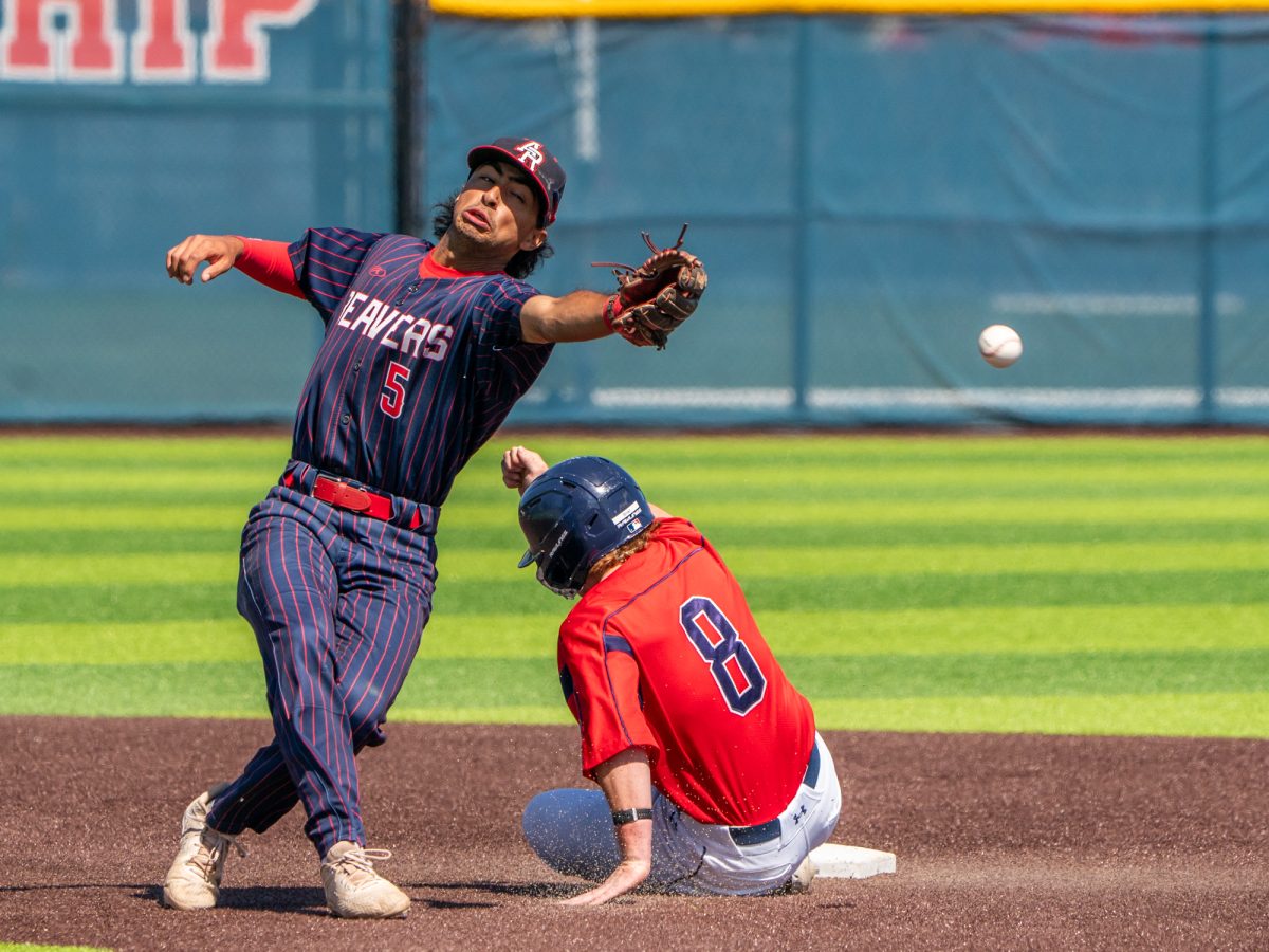 American River shortstop Ramon Esparza winces as the ball misses the pocket of his glove and Joe Brown advances to third on the throw in the bottom of the fourth in the first game of the 3C2A Baseball Regionals on Friday, May 2, 2025 at home. 
