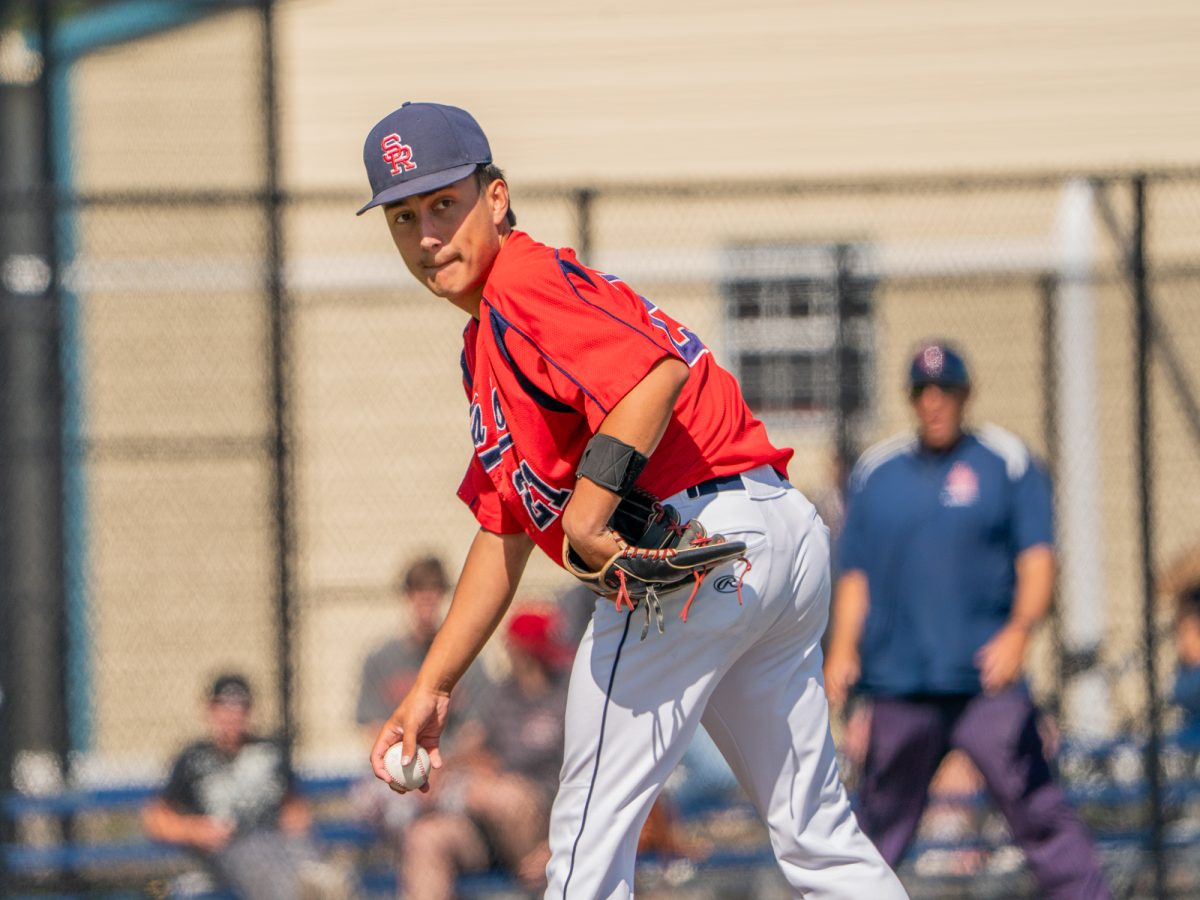 Sophomore pitcher Jordan Giacomini surveys the runner at first in the first game of the 3C2A Baseball Regionals against American River College on Friday, May 2, 2025 at home. 