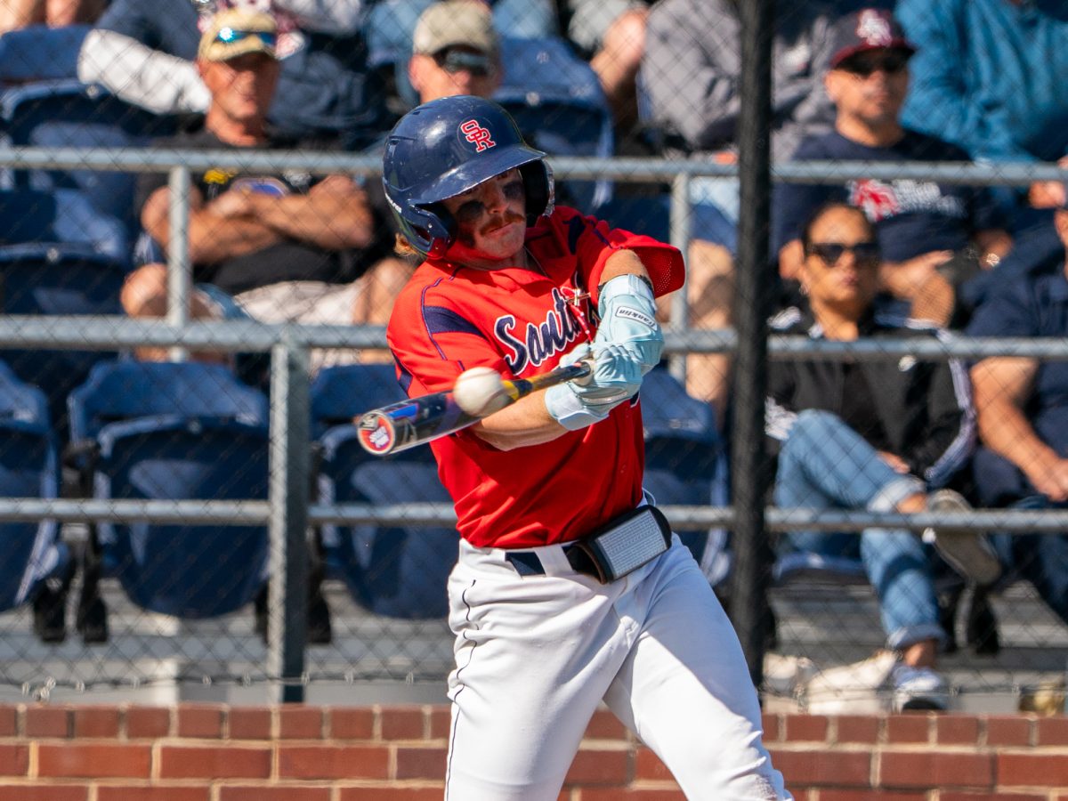 Sophomore second baseman Joe Brown hits a trip to right field in the bottom of the seventh inning in the first game of the 3C2A Baseball Regionals against American River College on Friday, May 2, 2025 at home. 