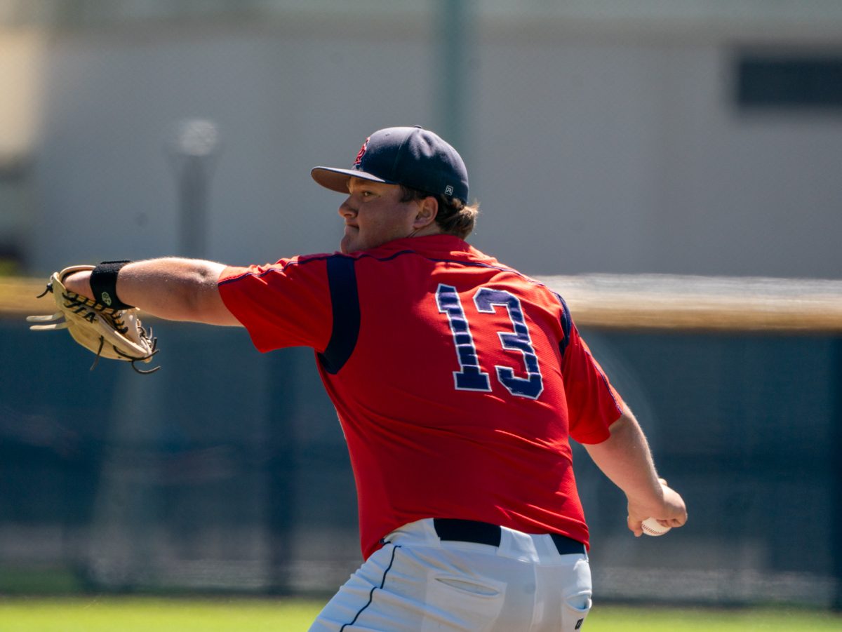 Sophomore Luke Dillon winds back for a pitch against Folsom Lake on the final day of the 3C2A Super Regional playoffs on Saturday, May 10, 2025 at home. 