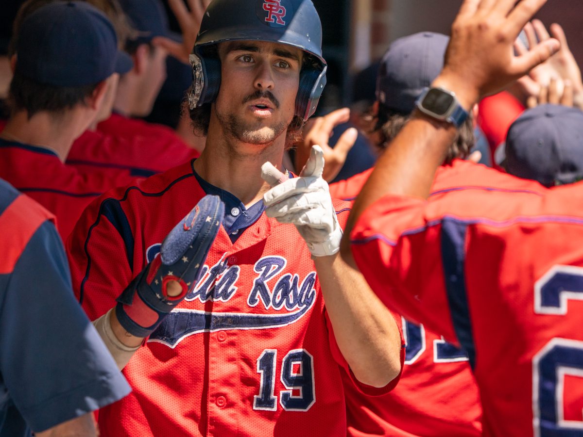 Freshman Cooper Woods walks through the dugout after sophomore Josh Martin's single to center in the top of the second sends him home to score against Folsom Lake on the final day of the 3C2A Super Regional playoffs on Saturday, May 10, 2025 at home. 