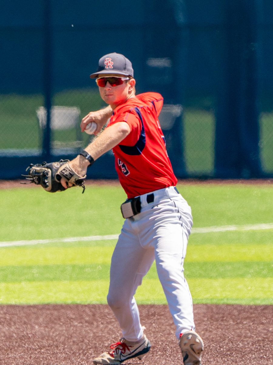 Sophomore Tyler Nordyke snags a grounder to third and winds back to throw the ball to first base for the out against Folsom Lake on the final day of the 3C2A Super Regional playoffs on Saturday, May 10, 2025 at home. 