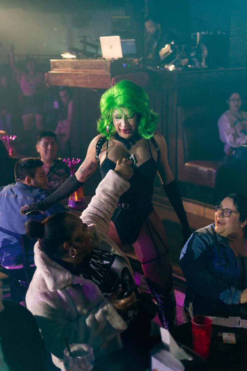 Roxy DelValle safely keeps their tips in an unforseen and soft location during a performance at Hamburger Mary's in Long Beach, California on March 7, 2025.