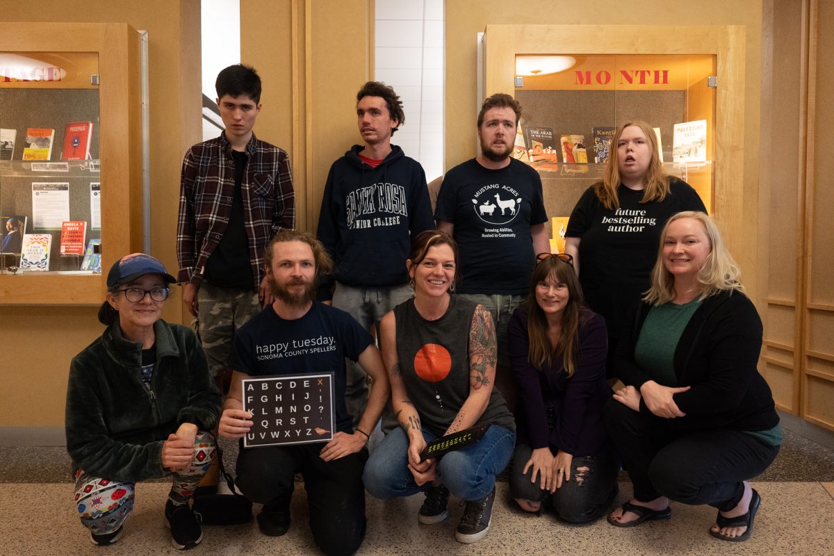 The "Spellers" meet in Doyle Library with their Communication Regulation Partners. Back row (left to right): Dean Carlson, Noah McSweeney, Ryan Heller, Kira Duley. Front Row (left to right): Martha Carlson, Buckminster Barrett, Lindsey Goodrich, Erica Richards, Nancy Dulet