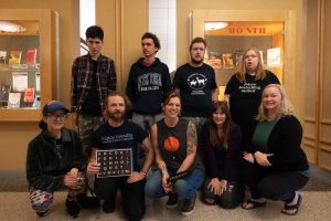 The "Spellers" meet in Doyle Library with their Communication Regulation Partners. Back row (left to right): Dean Carlson, Noah McSweeney, Ryan Heller, Kira Duley. Front Row (left to right): Martha Carlson, Buckminster Barrett, Lindsey Goodrich, Erica Richards, Nancy Dulet