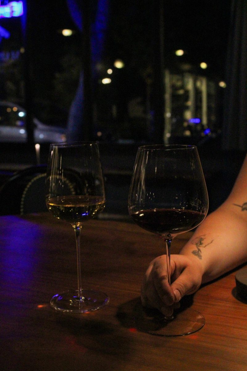In the age of being more connected than ever online, young adults are feeling less connected to their social circles. Two friends decompress over a glass fo wine at Maison in Healdsburg on Saturday, May 10. 