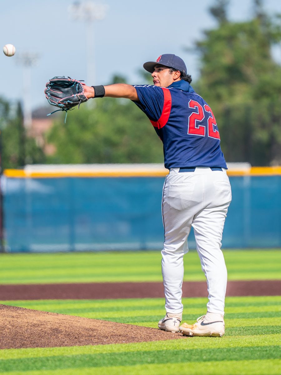 Sophomore pitcher Raul Valdivia receives the ball back post-pitch from catcher Mason Cox in the top of the eighth against Sierra in game one of the 3C2A Regional Finals on Friday, May 16, 2025 in Santa Rosa.