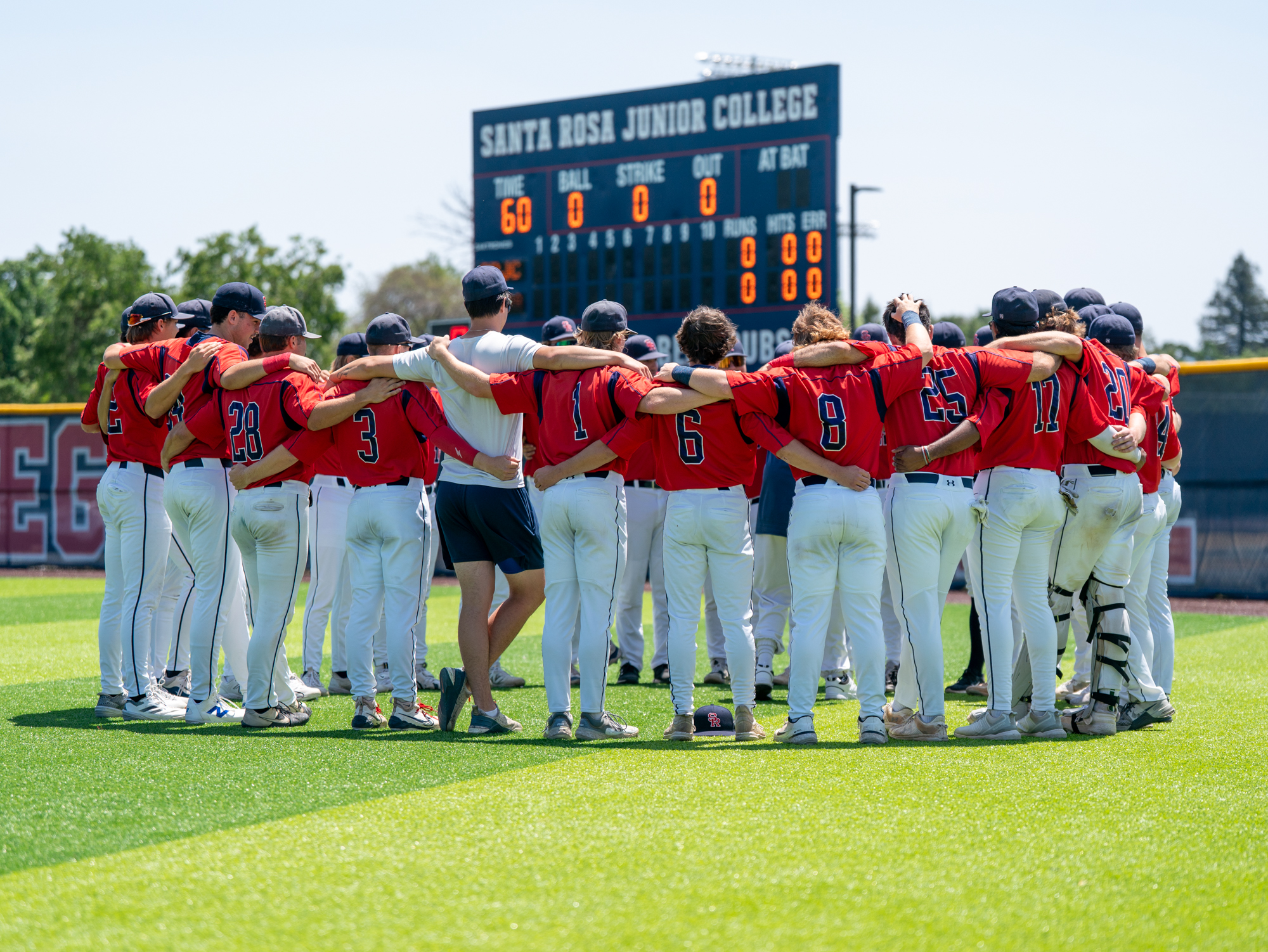The Santa Rosa Junior College baseball team huddle together in preparation of game two against Sierra in the 3C2A Regional Finals on Saturday, May 17, 2025 in Santa Rosa.