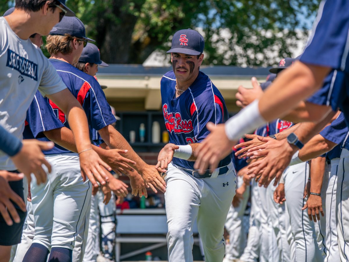 Sophomore and University of Hawaii at Manoa commit Josh Martin runs out for lineup one final time before playing against Sierra in game three of the 3C2A Regional Finals on Sunday, May 18, 2025 in Santa Rosa.