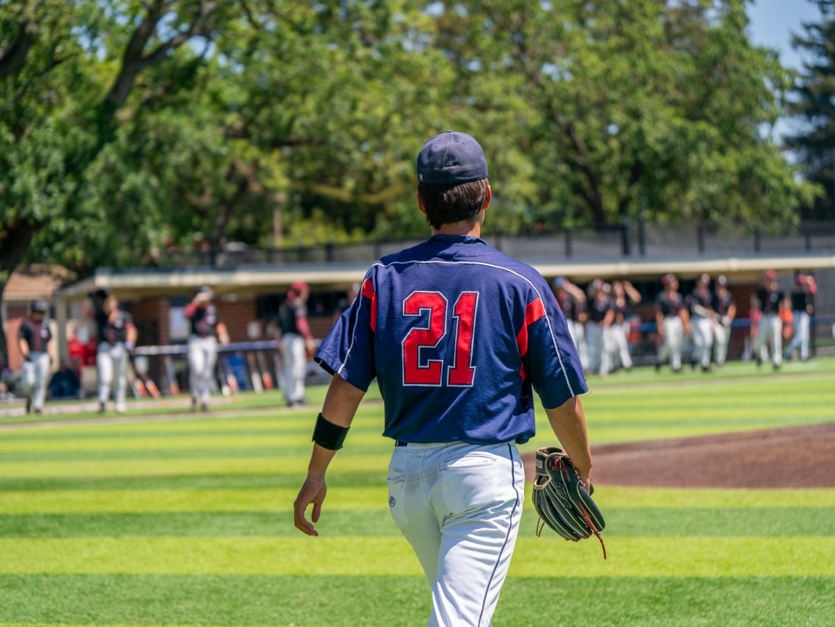 Sophomore and University of Nevada, Reno commit Jordan Giacomini walks towards the infield prior to starting as pitcher against Sierra in game three of the 3C2A Regional Finals on Sunday, May 18, 2025 in Santa Rosa.