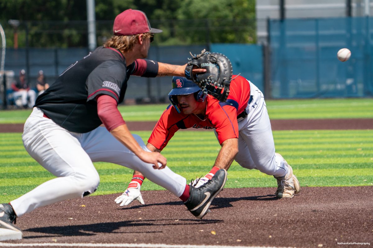 Santa Rosa Junior College's freshman left-fielder, Shane Moran dives back to first base during game two of the 3C2A Regional Finals on Saturday, May 17, 2025 in Santa Rosa. 