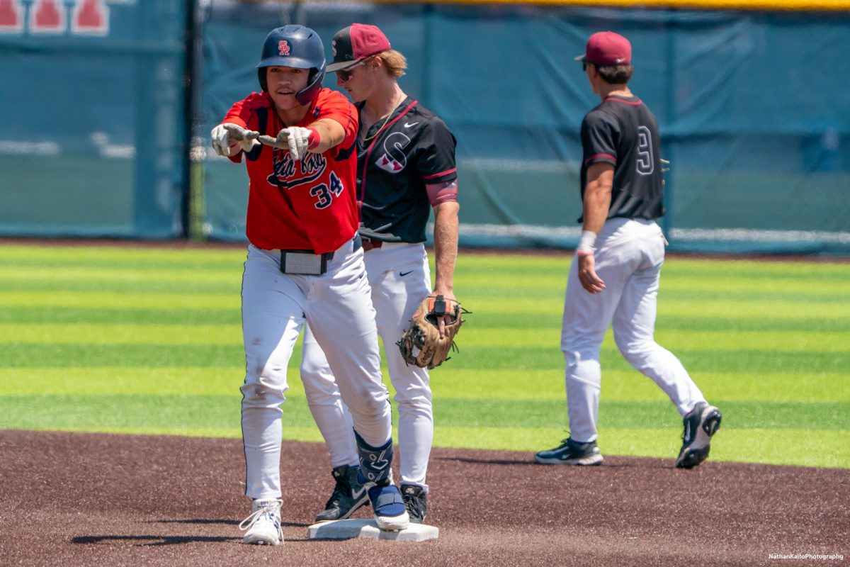 Santa Rosa Junior College's freshman designated hitter, J.T. Summers celebrates towards the bench after hitting a double during game two of the 3C2A Regional Finals on Saturday, May 17, 2025 in Santa Rosa. 