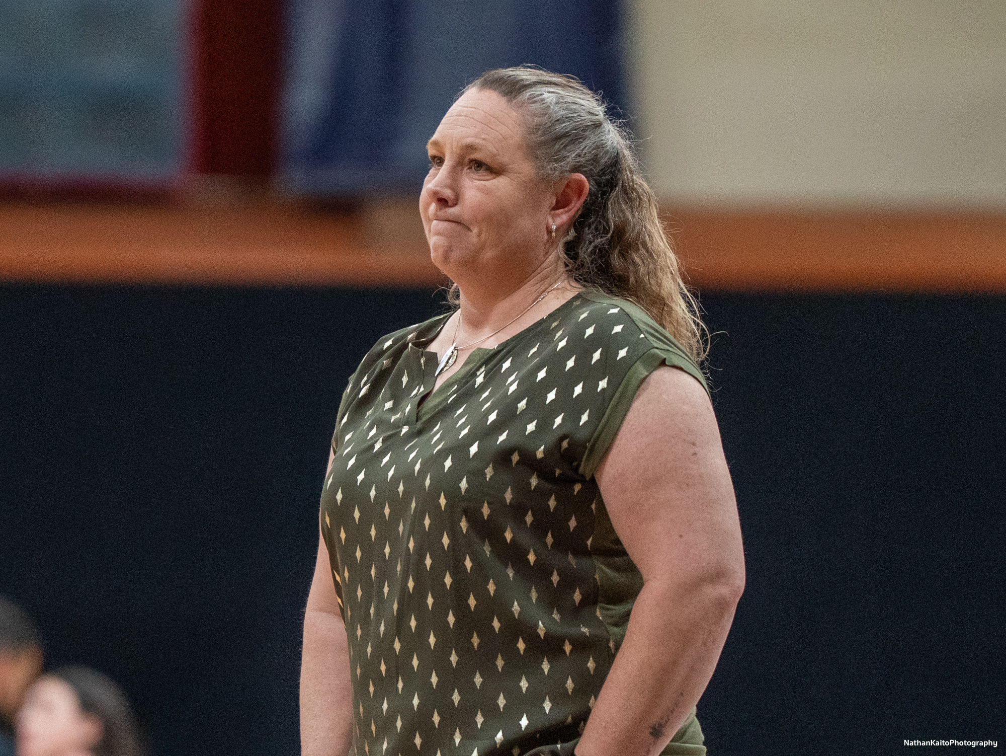 Lacey Campbell looks on from the baseline as her team faces The College of the Redwoods in the first round of 3C2A NorCal playoffs on Wednesday, Feb. 26, 2025 at Haehl Pavilion. 