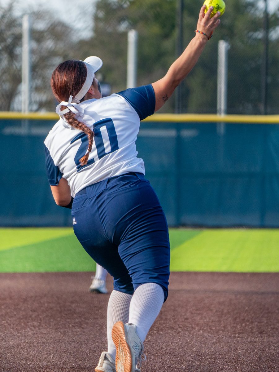 Sophomore third baseman Gabby Schenone launches the ball towards second base during the game against Hartnell College on January 24, 2025 at home.