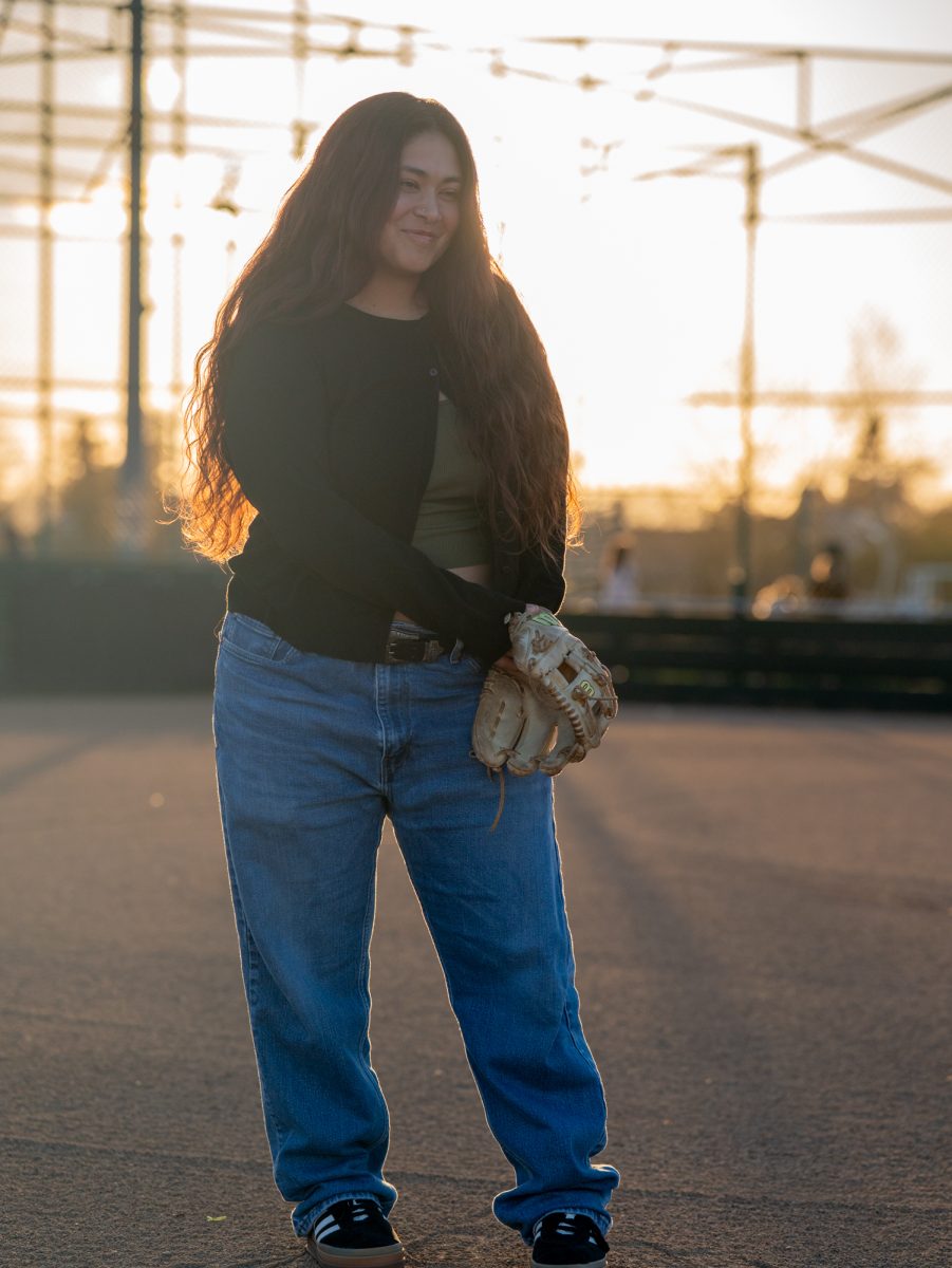 Gabby Schenone reflects as she stands on the field where she got her softball career started at Magnolia Park on January 28, 2025 in Rohnert Park, California.