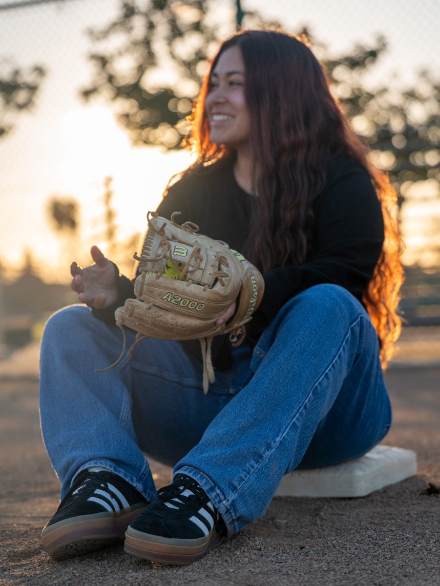 Gabby Schenone takes a seat on one of the softball bases at Magnolia Park on January 28, 2025 in Rohnert Park, California.