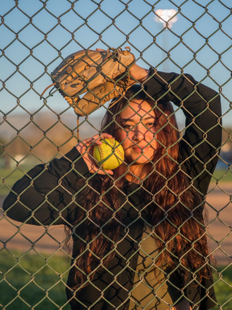 Gabby Schenone gazes through the fence along the Magnolia Park softball field on January 28, 2025 in Rohnert Park, California.